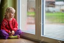 Little Girl Sits Near Window, Portrait Stock Photo, Picture And Royalty Free Image. Image 15755030.