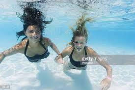 119 Two Teenage Girls Swimming Underwater In Swimming Pool Photos and Premium High Res Pictures - Getty Images