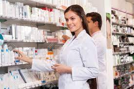 Smiling Woman Pharmacist At The Chemists Shop Stock Photo, Picture And Royalty Free Image. Image 48605945.