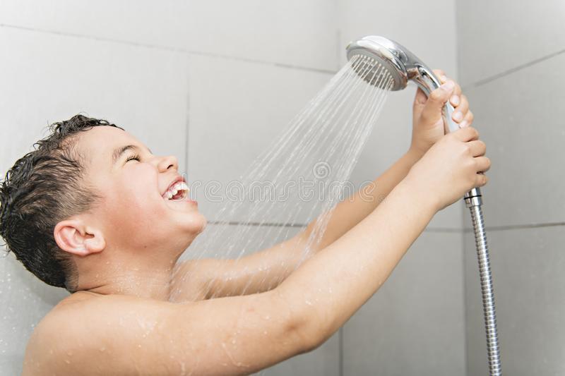 A Nice Boy on the Shower Having Fun Stock Photo - Image of cute, bath: 129628730