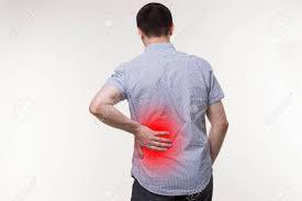 Back Pain, Kidney Inflammation, Man Suffering From Backache, Painful Area Highlighted In Red Stock Photo, Picture And Royalty Free Image. Image 130209553.