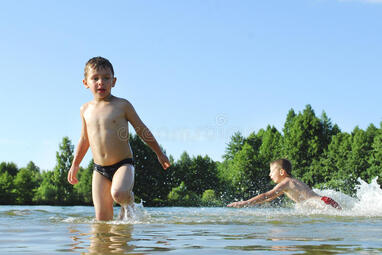 Boys swimming in the lake. stock photo. Image of lifestyles - 37268672
