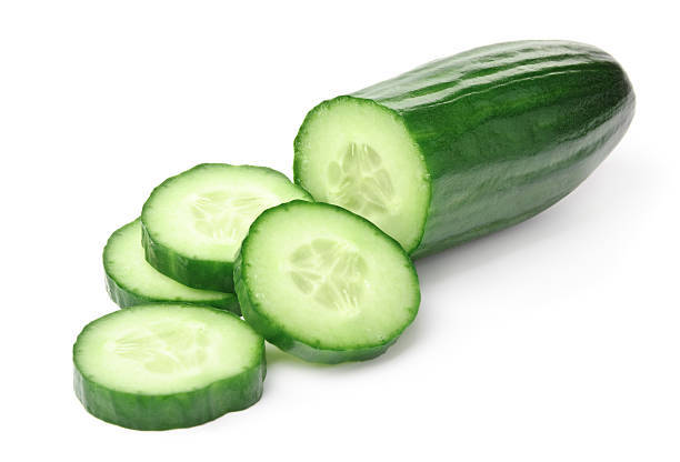 Cucumber Slices On A White Background Stock Photo - Download Image Now - Cucumber, Cut Out, Slice of Food - iStock