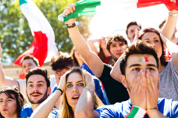 Italian Supporters During A Football Match Stock Photo - Download Image Now - Fan - Enthusiast, Italy, Adult - iStock