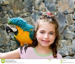 Girl Parrot Her Shoulder Stock Photos - Free & Royalty-Free Stock Photos from Dreamstime