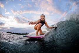 Surfing Girl Simply Ignores Physics and Hovers on the Ocean - AZ Animals
