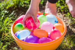 Colorful Water Bombs In Summer Stock Photo - Download Image Now - Water Bomb, Water, Balloon - iStock