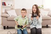 Brother and Sister Playing Video Games Together Stock Photo - Image of girl, game: 137839602